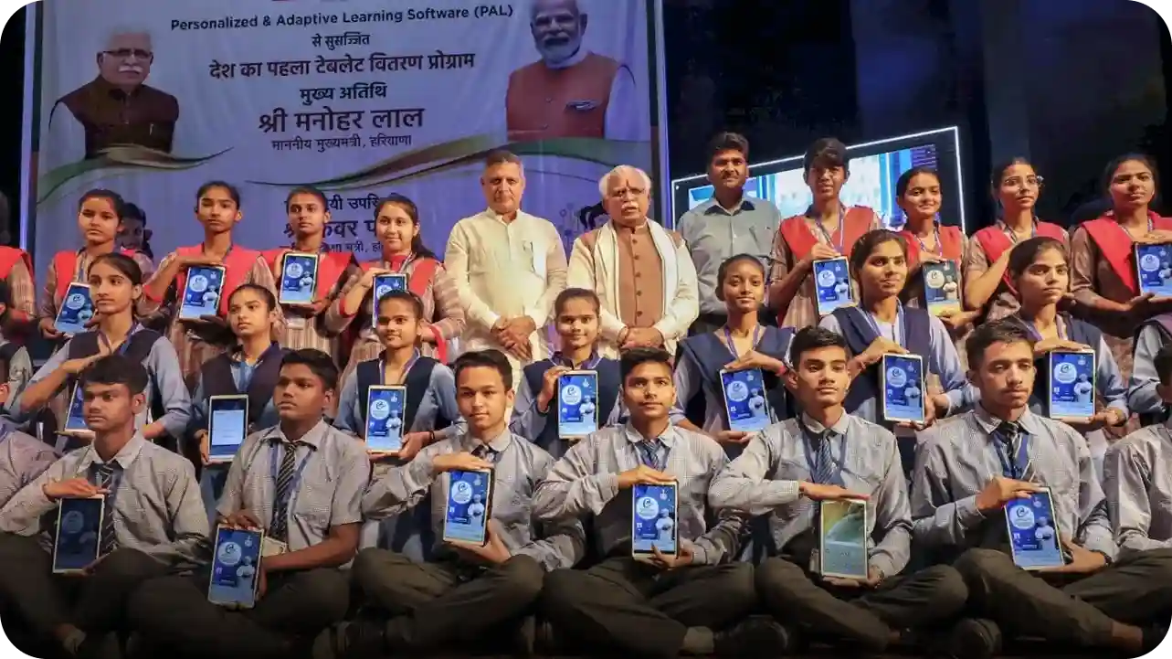 Group of students showing tablets equipped with iDream Education's personalized adaptive learning solution, they received under the E-Adhigam initiative.